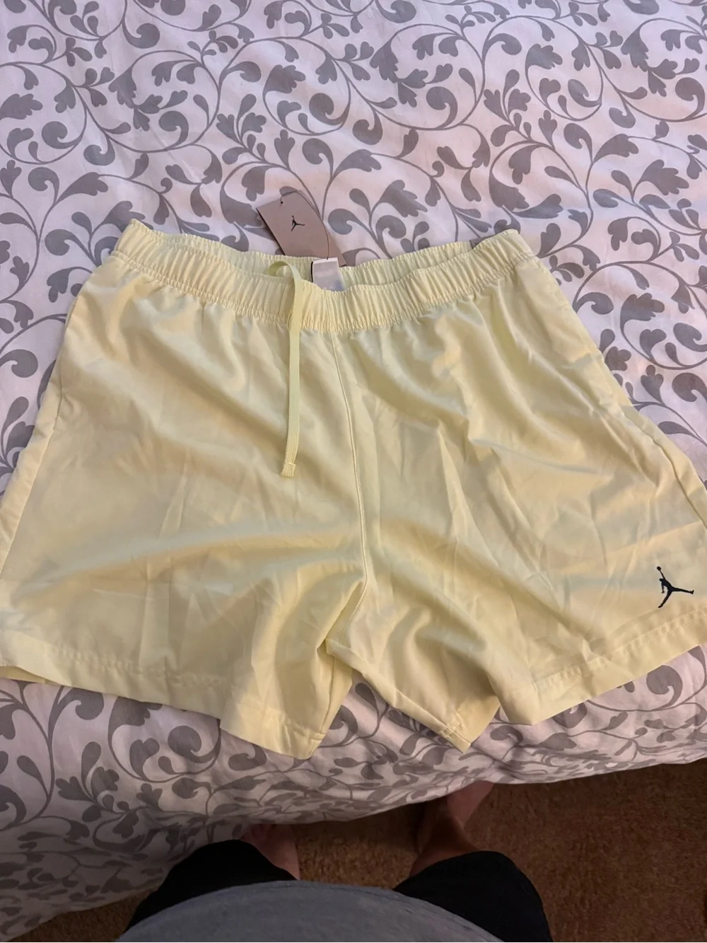 Jordan Men's Pale Yellow Athletic Shorts with Jumpman Logo